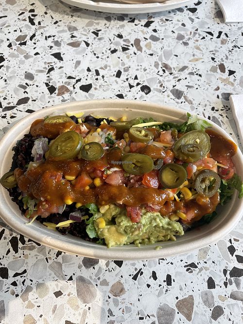 Regular burrito bowl - black rice, black beans, guac, corn, pico, jalapeños, vegan cheese   at Zambrero  in Birmingham