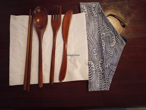 Wood utensils in cloth pouch at Takumi Cuisine in Decatur