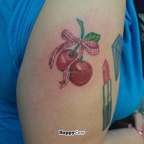 Cherries tattoo with vegan pigments by Eric Barmore at Tattoo Charlie's Preston Hwy. at Tattoo Charlies in Louisville