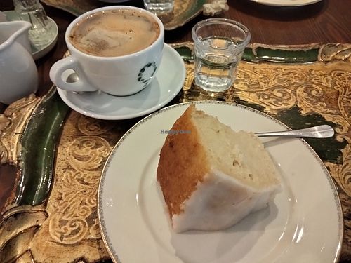 Coffee with oat milk & vegan lemon drizzle cake. at Café Wunderbar in Wiesbaden
