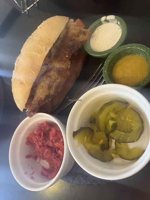 Hot dog with accompaniments  at Cocina Libre in San Jose