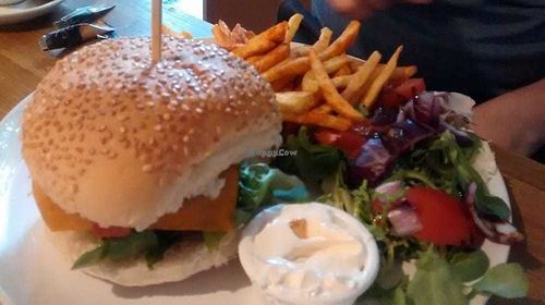 Smoked tofu and seitan burger with chips at Teatime Collective in Manchester