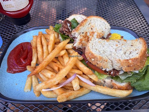 Deluxe Burger with fries  at Ravina Bay Bar & Grill in Lake Delton