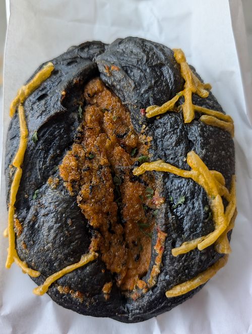 Charcoal bun with fishy filling at Wheat Allergy Baking Studio in Taichung