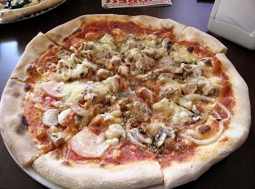 'Chicken', mushroom and onion pizza at Express Pizza in Copenhagen