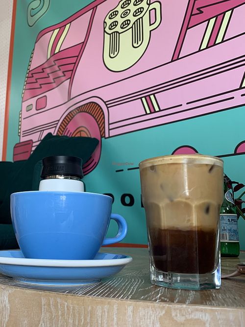 Oat latte and iced spice coconut latte (with oat milk)  at Six Shooter Coffee - Pearl Rd in Cleveland