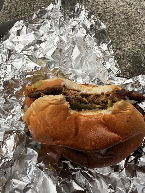 Burger wrapped in foil   at Tximist Smash in Bilbao
