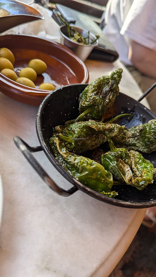 Padron peppers and olives at Bar San Juan in Manchester