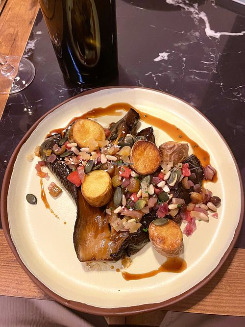 Eggplant with teriyaki sauce, assorted vegetables, various seeds, dairy-free lemon cream, and potatoes   at La Terrasse des Carmes in Saint-thome