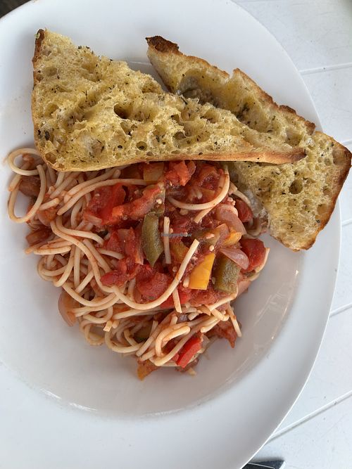 Spaghetti with Mediterranean pasta & garlic bread   at The Reef in Sandown