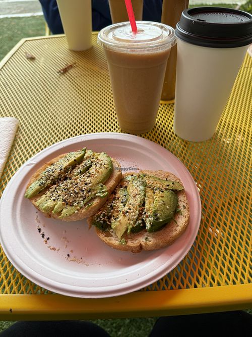 Vegan avocado toast, smoothie (reminds me of an orange Julius), and “Mexican” coffee veganized  at Sips in Miranda