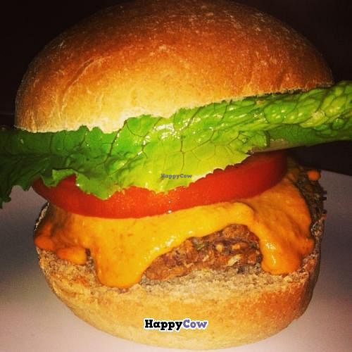 House-made Adzuki Bean & Buckwheat burger. Topped with cashew 'cheese' lettuce and tomato, on a wheat Niedlov's bun. Completely oil free and delicious! at Cashew in Chattanooga