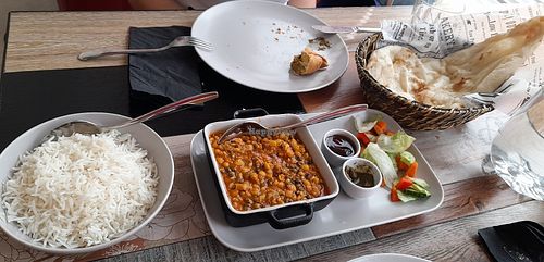 Dal Tadka and (a remaining piece of) vegetable samosa at Masala House in Espoo