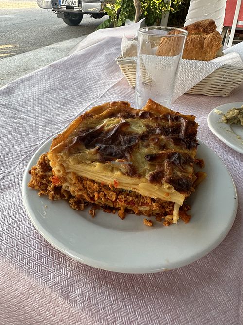 traditional greek dish made with soy mince and vegan bechamel  at Taverna Armodios - Ταβέρνα ο Αρμόδιος in Zaharo