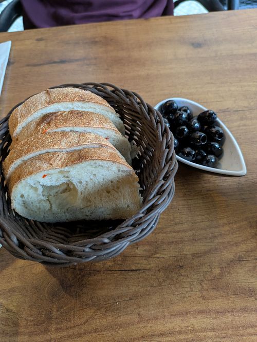 Complimentary bread and olives. at Ristorante Café Aroma in Berlin