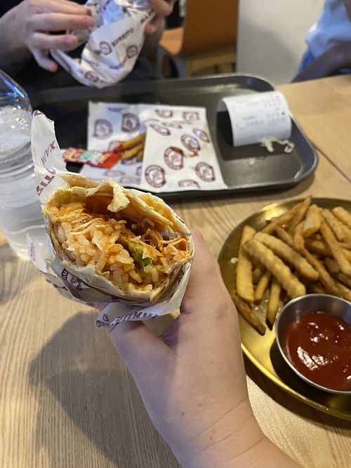 Burrito with avocado, chilli sauce and rice. Plus fries  at Maximo Burrito - 멕시모부리또 in Suwon