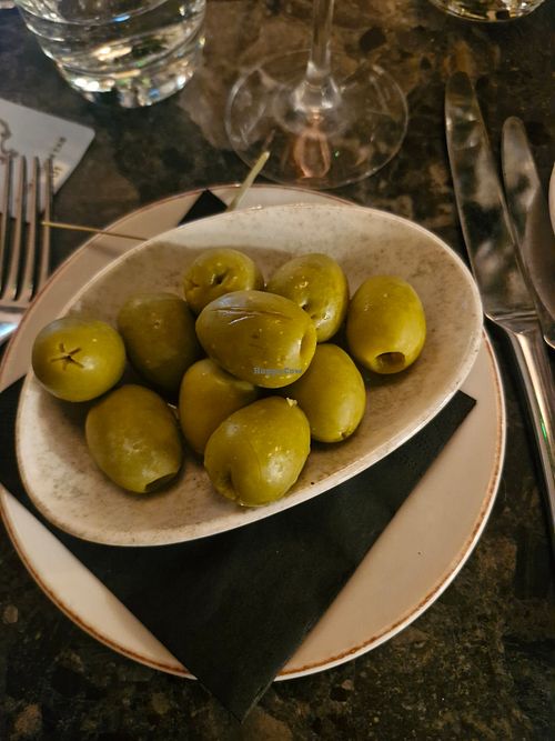 Pitted Gordal olives, marinated with guindilla chillies at Piccolino in Wilmslow