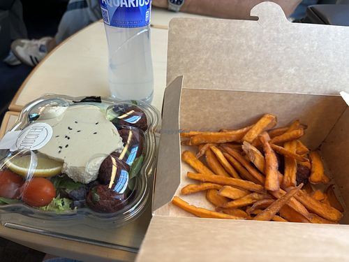 Falafel hummus salad and sweet potato fries (boniato) and I asked the guy to slip a falafel or two with it, but they are not allowed to really. But give it a try  at Como Express in Madrid