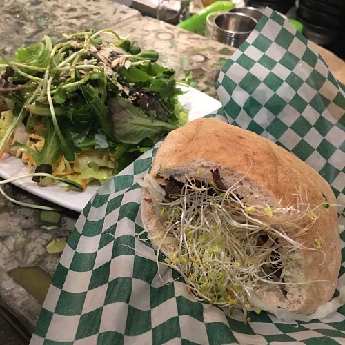 Sandwich Karma Shawarma avec petite salade at Panthere Verte - Plateau in Montreal