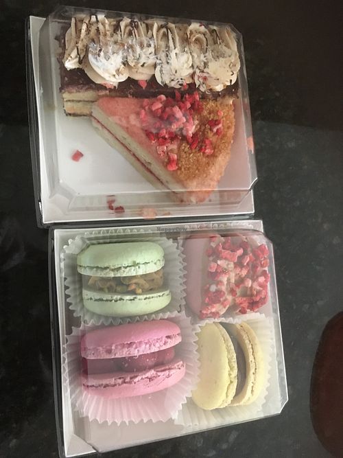 Assorted macarons, hazelnut Opera cake, strawberry cake at Bakenary at 124 Street Grand Market in Edmonton