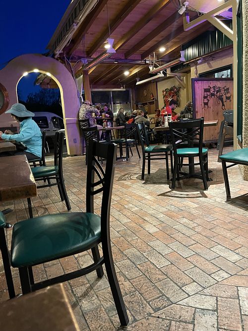 Outdoor patio with heaters  at Oscar's Cafe in Springdale