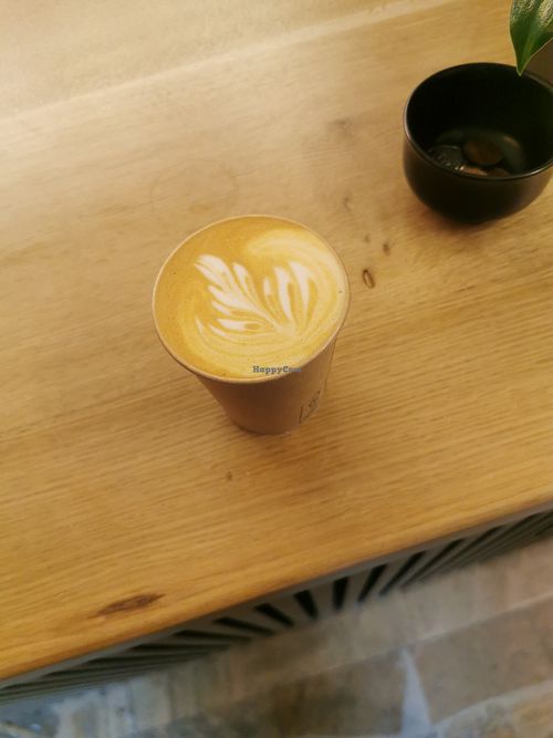 oat flat white at Klobouk dolů coffee in Cesky Krumlov