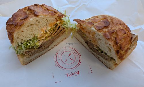 Tofurky Roasted Turk'y deli slices, Vegenaise, lettuce, and red Italian dressing on a Dutch Crunch Roll at The Baker's Mark in Portland