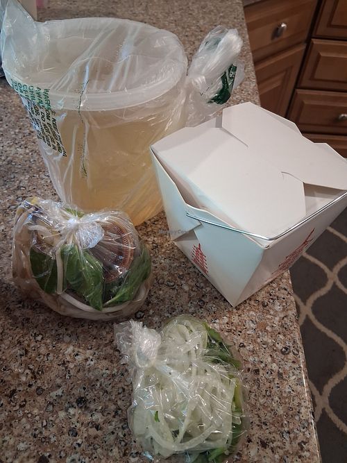 Large  pho packaging for take out at Mi La Cay in Wheaton