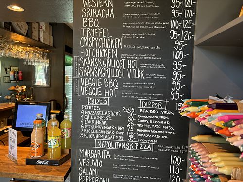 Menu with two vegan options 8,27€ more or less in August 2024. Large french fries 3€  at alm's (Falsterbogrillen) in Falsterbo