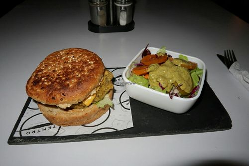 Veganized burger with dairy cheese. at El Manso Boutique Hostel Restaurant in Guayaquil