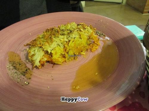 Grated vegetables and potatoes over a chickpea base - main course of set lunch menu. at Rayen Vegano in Madrid