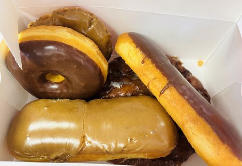 Chocolate, maple, old-fashioned, and apple fritter donuts   at Ronald's Donuts in Las Vegas