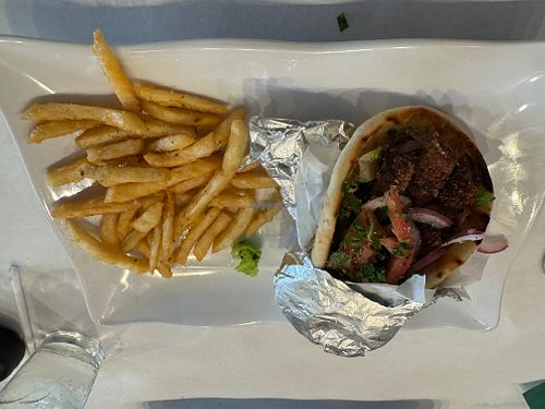 Impossible pita wrap and French fries at Oliv Pit Athenian Grill in Boca Raton
