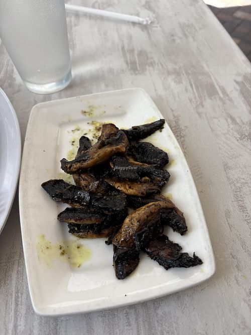 Grilled mushroom mushrooms  at Oliv Pit Athenian Grill in Boca Raton