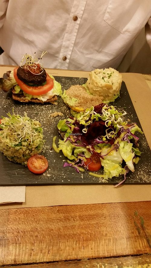 A plate which contained a portion of each of the main course dishes on the menu. Tasted amazing! at El Cafe Blueproject in Barcelona