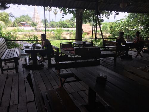 Rustic setting next to river  at Happy Green in Chiang Mai
