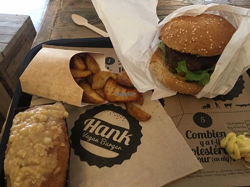 burger, potato wedges, carrot cake at Hank Cuisine Végétale - Archives in Paris