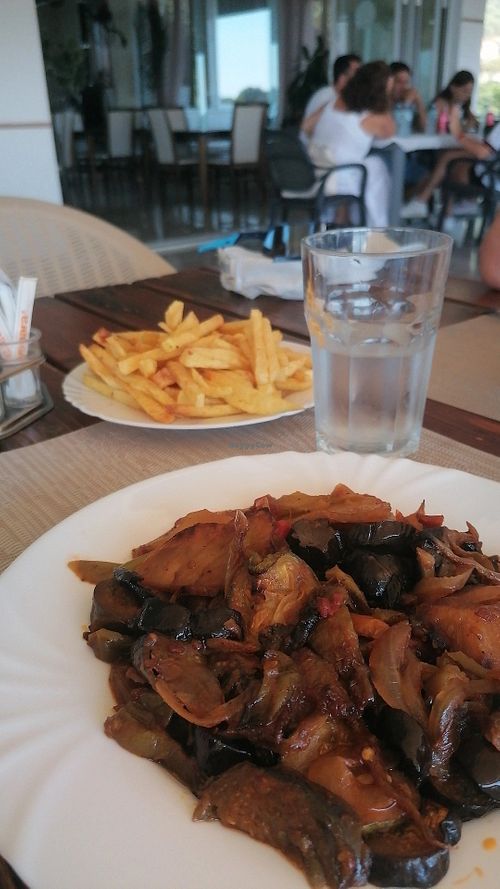 Biram (eggplant, potatoes, tomatoes, onions, oil) and French fries. at Perla Cafe Restaurant in Lukove