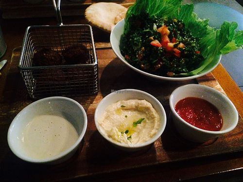 tabbouleh salad, falafel pieces, pitta and dip at Umi Falafel - Dame St in Dublin