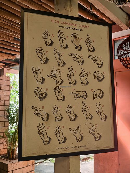 The restaurant is staffed by disabled people, primarily from the Deaf community, and there are cool guides on the walls at Mister Saigon in Dumaguete