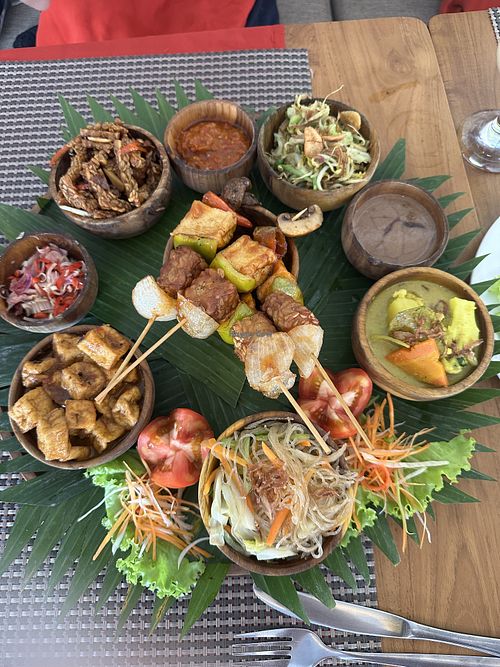 Huge vegan platter to share. Everyone said it feeds two… two of us could not finish it! The tempeh was my fav part though. Very tasty!   at Garlic Restaurant Bali in Nusa Dua
