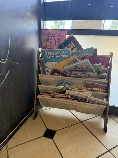 Bookshelf in kids play area   at Cassidy's Corner Cafe in La Mirada