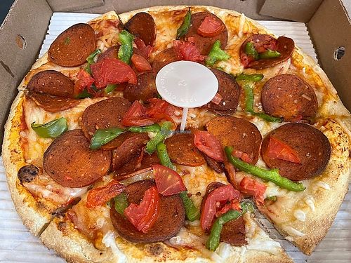 Vegan pizza with pepperoni at Pizza Pizza - Notre Dame in Montreal