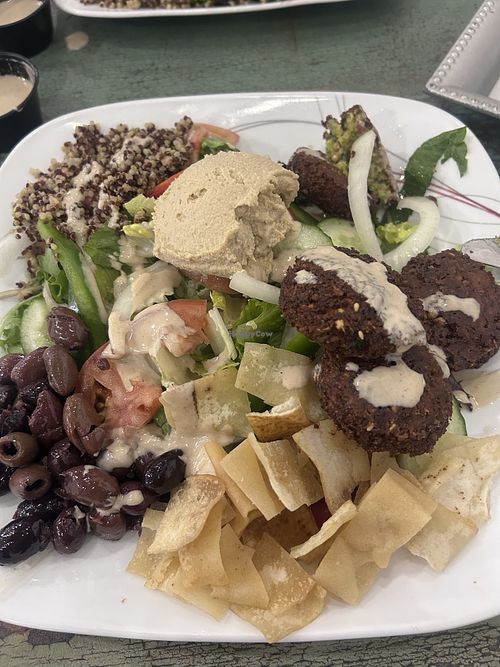 Mediterranean bowl minus the feta and extra falafel instead of grape leaves.  at AlBasha Mediterranean Grill  in Manchester