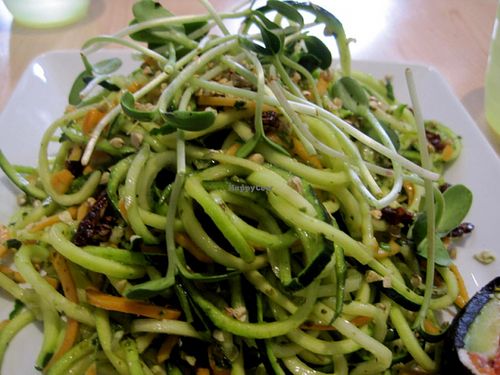 Zucchini and sweet potato noodles with pesto and sun-dried tomatoes at Om Prana in Quebec