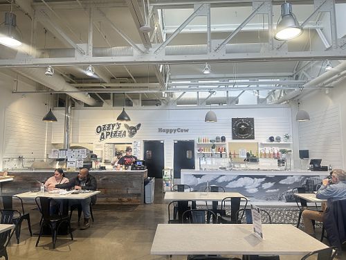 Counter service within market  at Ozzy's Apizza - Food Stand in New Haven