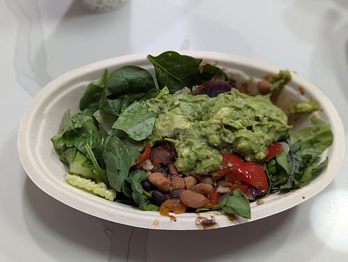 Veggie salad bowl with black/pinto beans, rice, fajita veggies, and guacamole at Chipotle - W Dickson St in Fayetteville