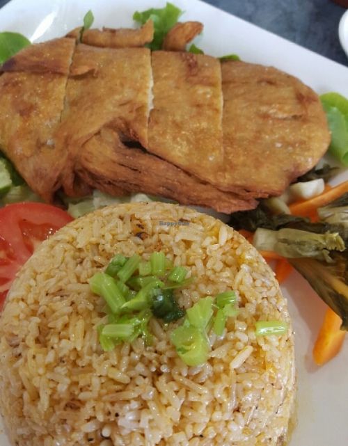 Crispy soy chicken with tomato rice at World Vegan in Cabramatta