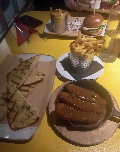 Garlic bread, vegan breaded chicken and fries at Jolly Postie in Royston