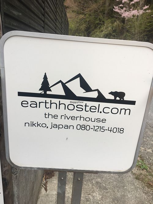 Outdoor sign at Earth Hostel - Nikko Riverhouse in Nikko